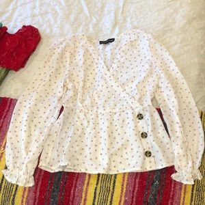 White and pink polka dot blouse